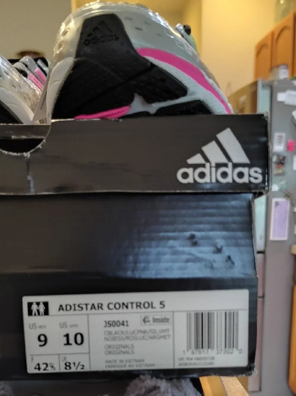 Adidas adiStar Control 5 features a Core Black, Lucid Pink, and Silver Design